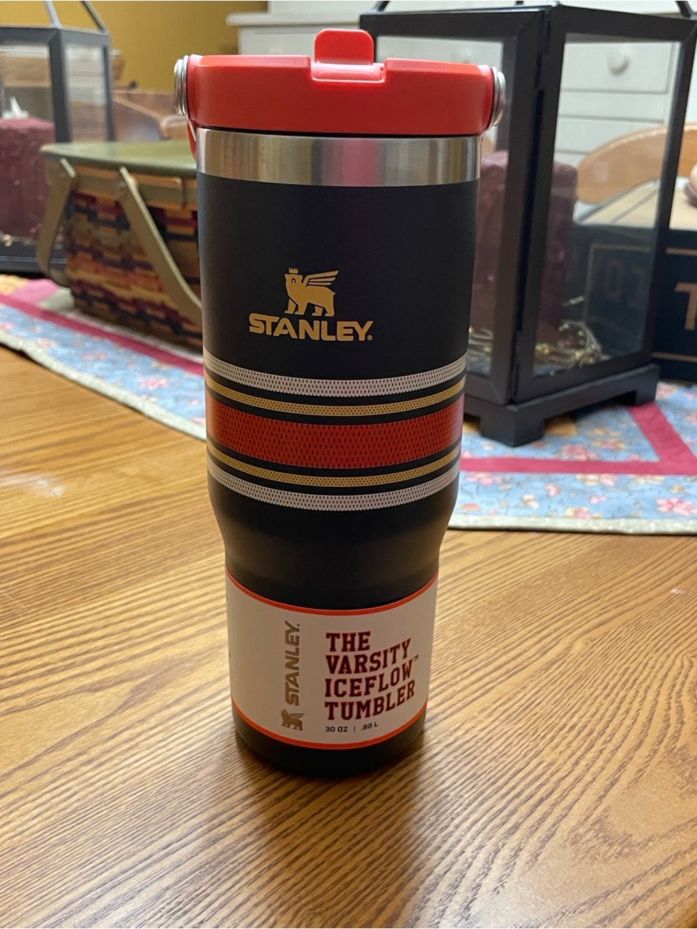 Stanley Black Tumbler with Red and Gold Stripe